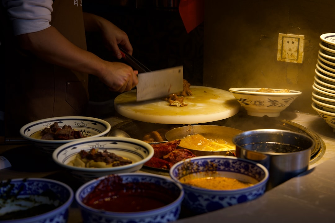 Professional chef working at a kitchen station during service